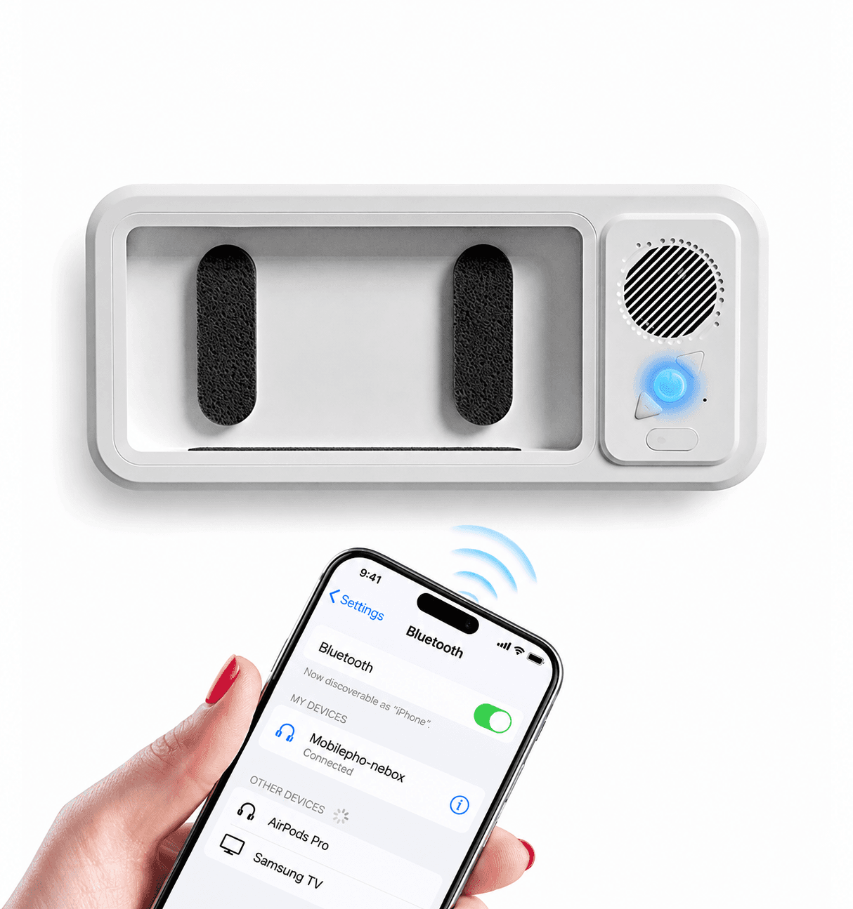 Splash Dock wall-mounted with its power button lit, paired over Bluetooth to an iPhone